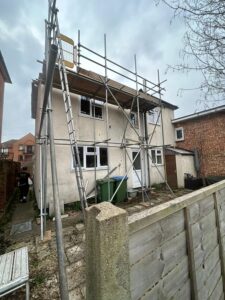 Roof repair scaffolding with access retained beneath the working platform in Southampton